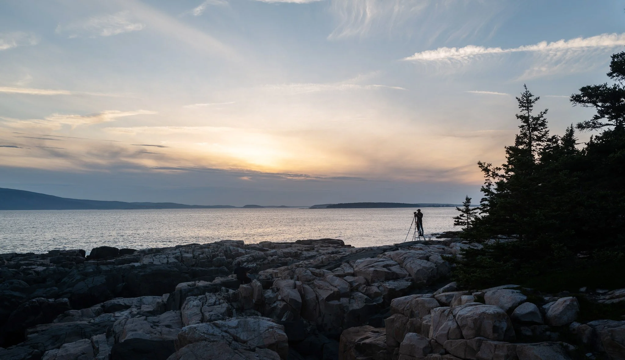 Austin Mann at the tripod on the Acadia coast at sunset