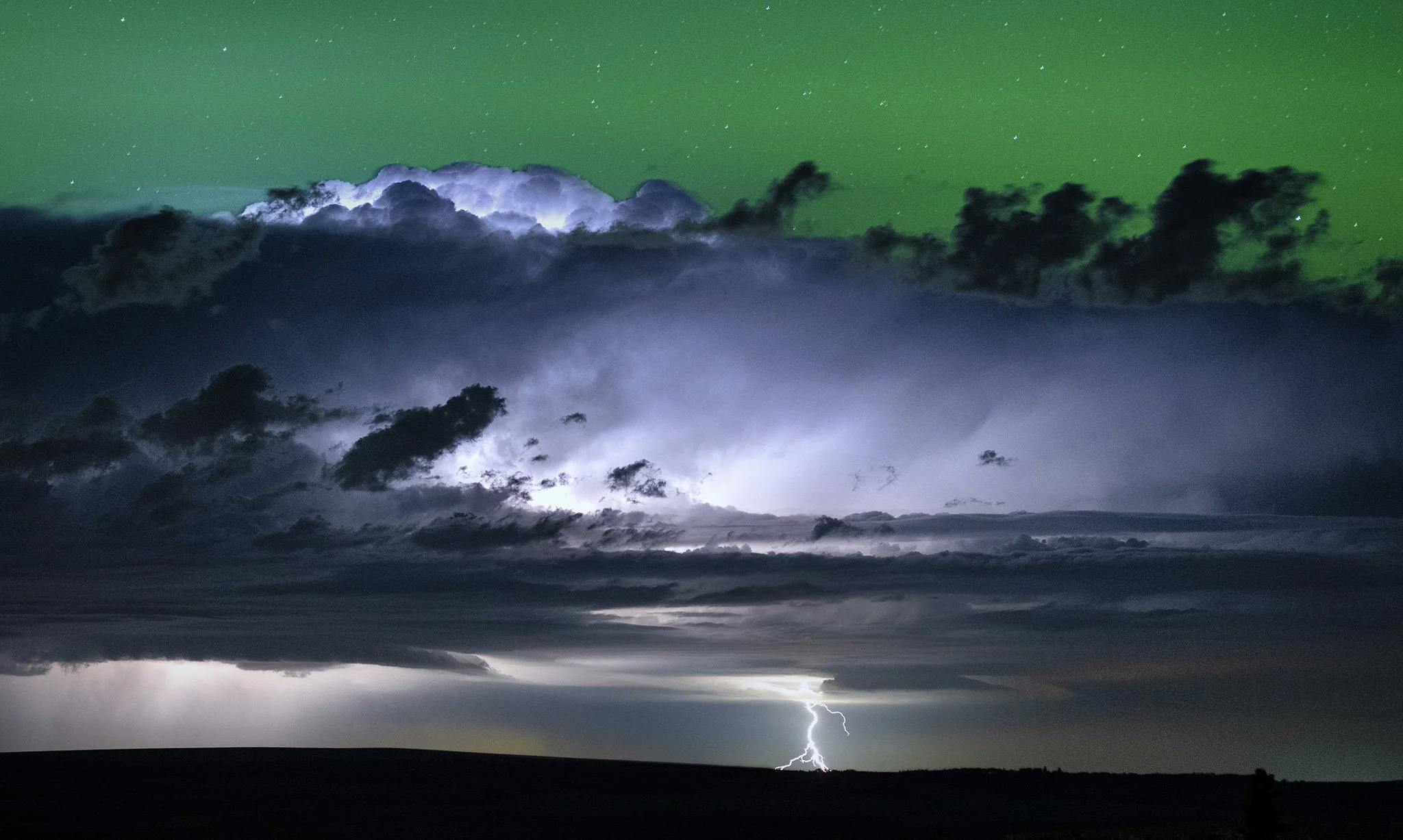 Lightning and aurora over Glacier