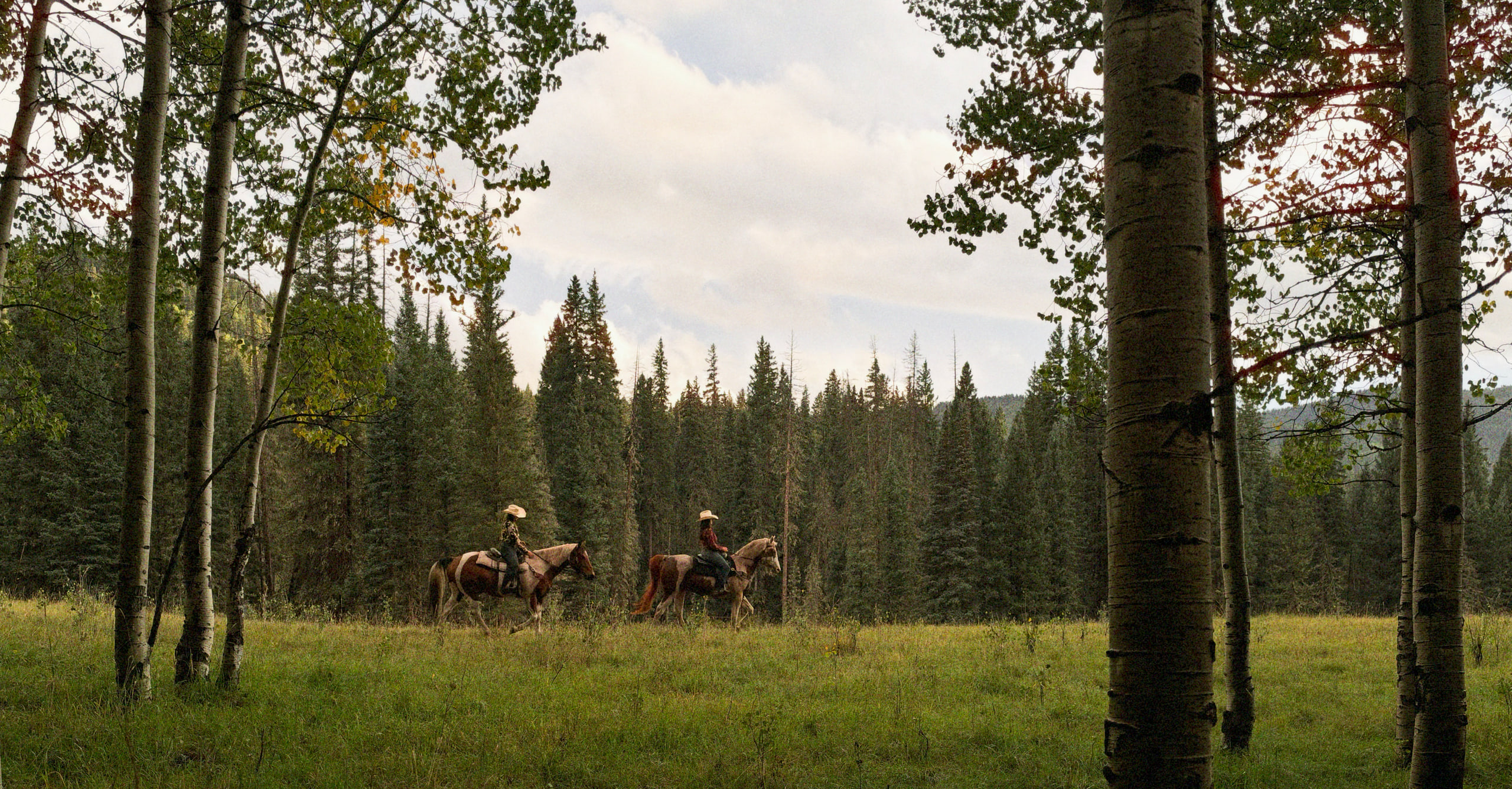 Horseback riding in the high Rockies through Dunton property