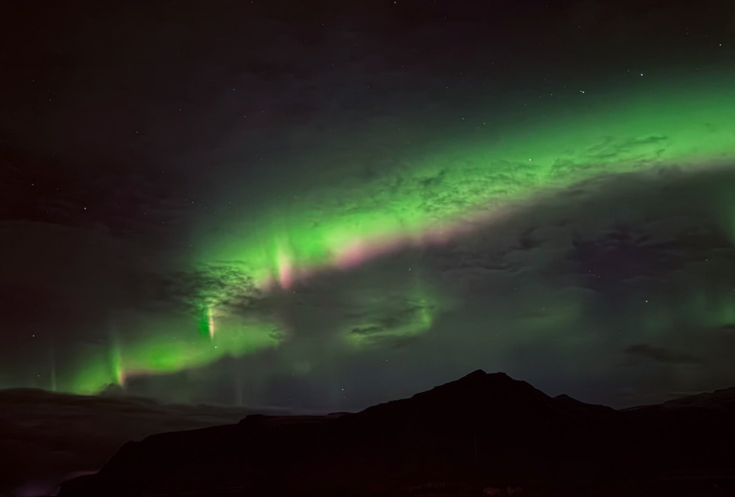 Aurora over southern Iceland. Night mode, no tripod, Duo in seated position
